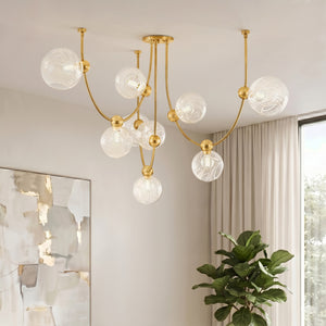 Zerra 67" Nine Light Chandelier, Vintage Brass