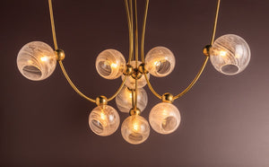 Zerra 67" Nine Light Chandelier, Vintage Brass