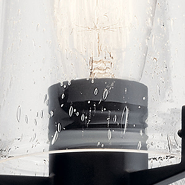 Buster 5" One Light Wall Sconce, Clear Seeded Glass / Black