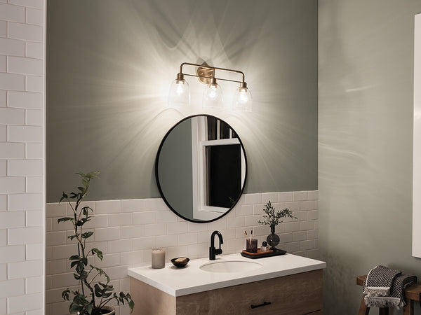 Vaughn 24" Three Lights Vanity Light, Clear Glass / Champagne Bronze