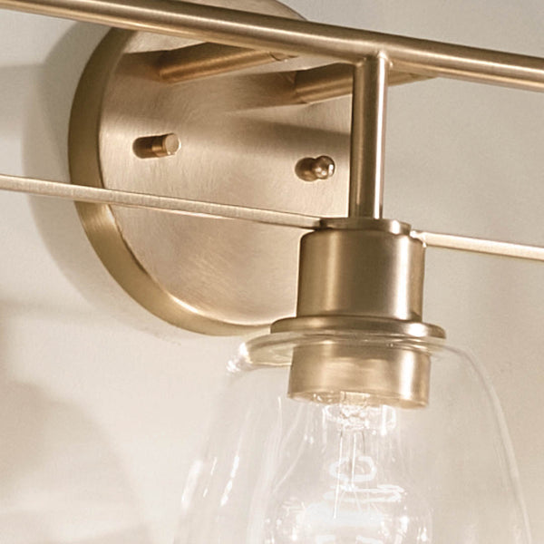 Vaughn 24" Three Lights Vanity Light, Clear Glass / Champagne Bronze