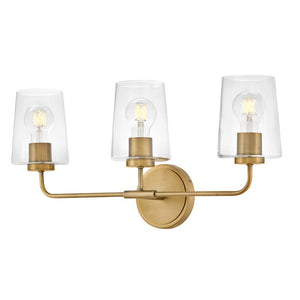Quaan 24" Three Lights Medium Vanity, Heritage Brass / Clear Glass