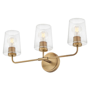 Quaan 24" Three Lights Medium Vanity, Heritage Brass / Clear Glass