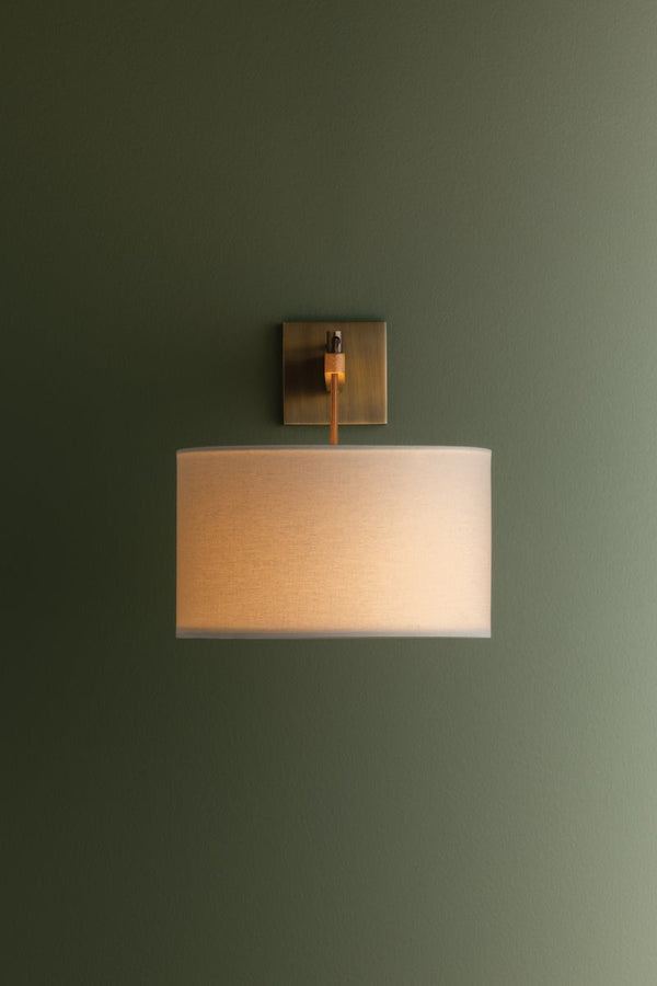 Isorae 12" One Light Wall Sconce, Patina Brass