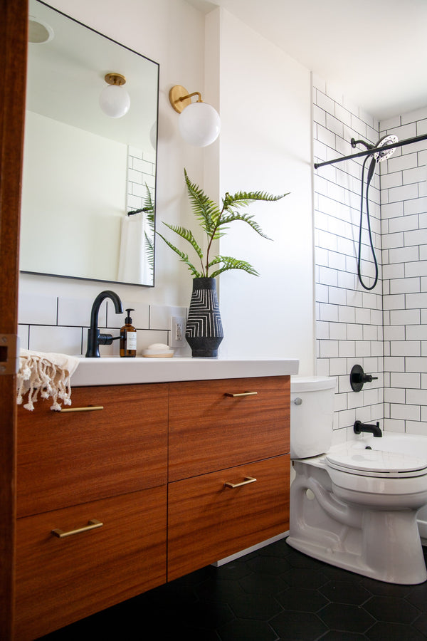 Fenorae 7" One Light Wall Sconce, Aged Brass