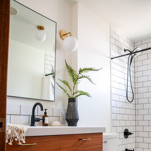 Fenorae 7" One Light Wall Sconce, Aged Brass