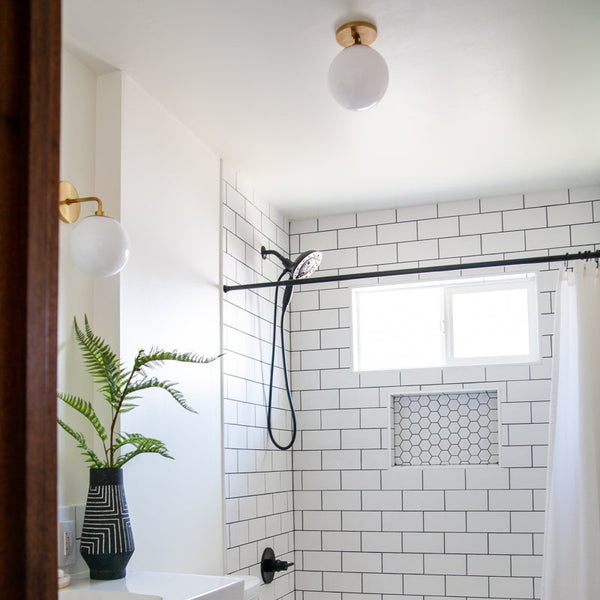 Fenorae 7" One Light Wall Sconce, Aged Brass